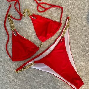 Swim suit Red with golden chain.